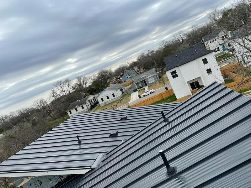 Standing seam metal roof panels with vents for Skylight Repair in Chippewa